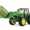 JD BIG FARM TRACTOR W/BALE MOVER 7330